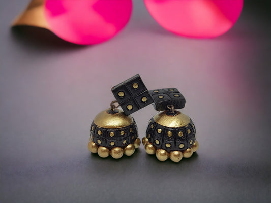 Black and gold Terracotta Anaya Jhumka earrings with dotted design from Anusangi Collections