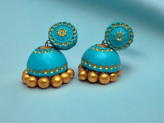 Turquoise blue terracotta earrings with gold bead accents from Anusangi Collections