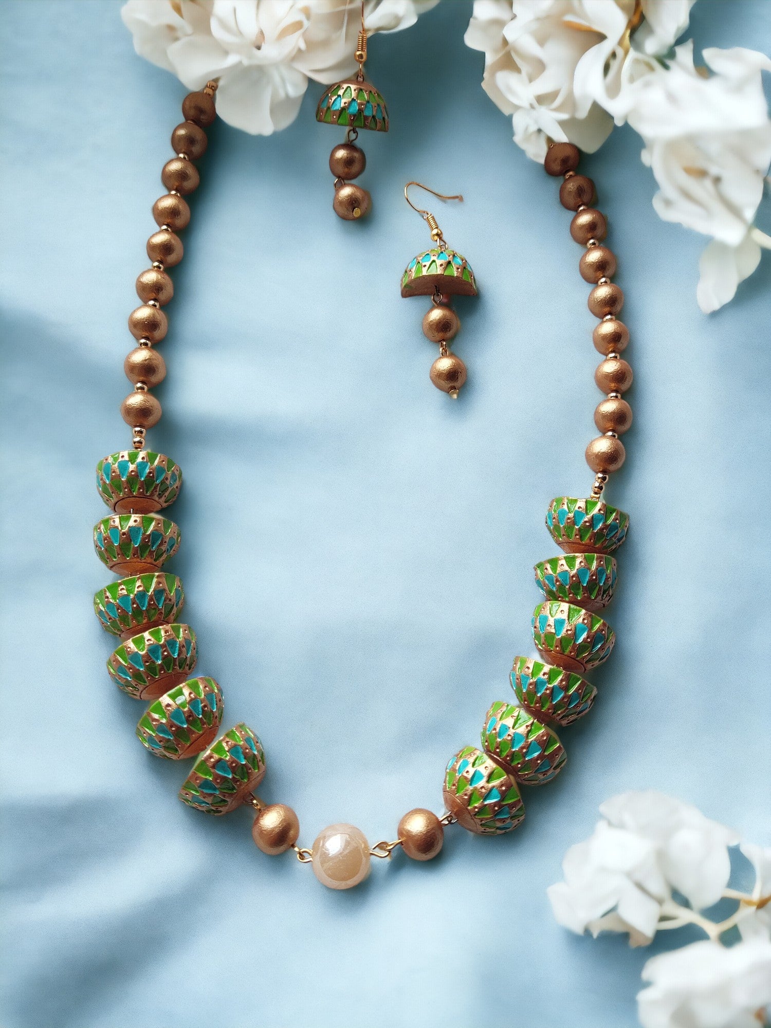 Anusangi Collections unique terracotta earrings and necklace set with green and gold accents