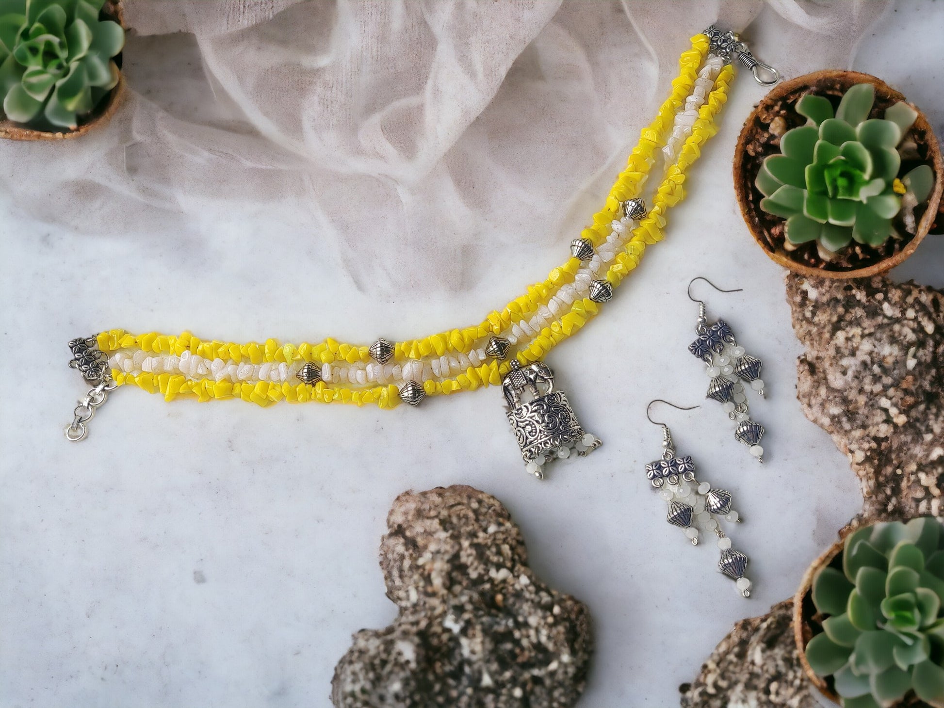 Anusangi Collections uncut beaded choker necklace set in yellow and white with matching silver earrings