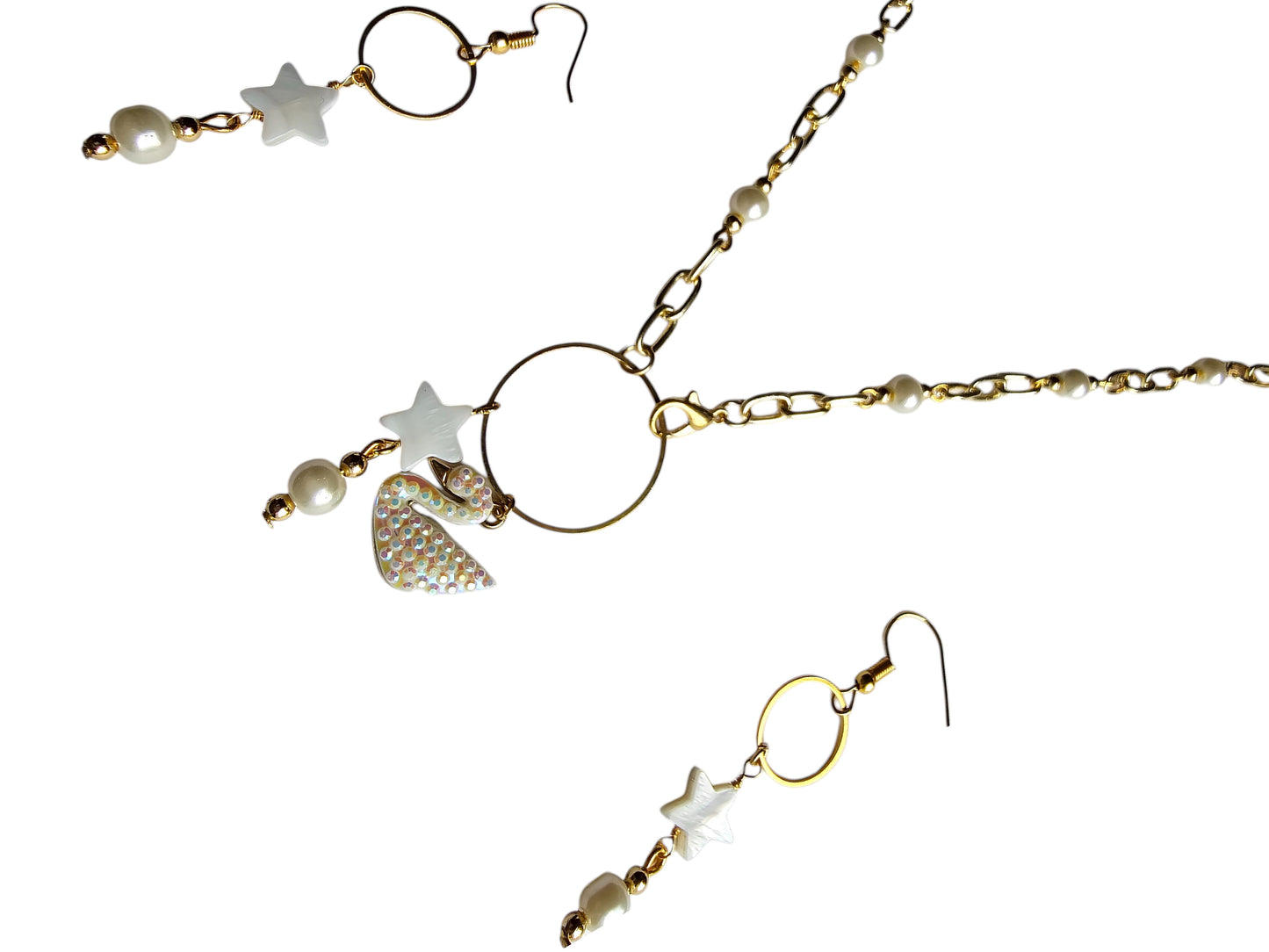 Anusangi Collections white pearl station necklace for women with blue gemstones and matching earrings