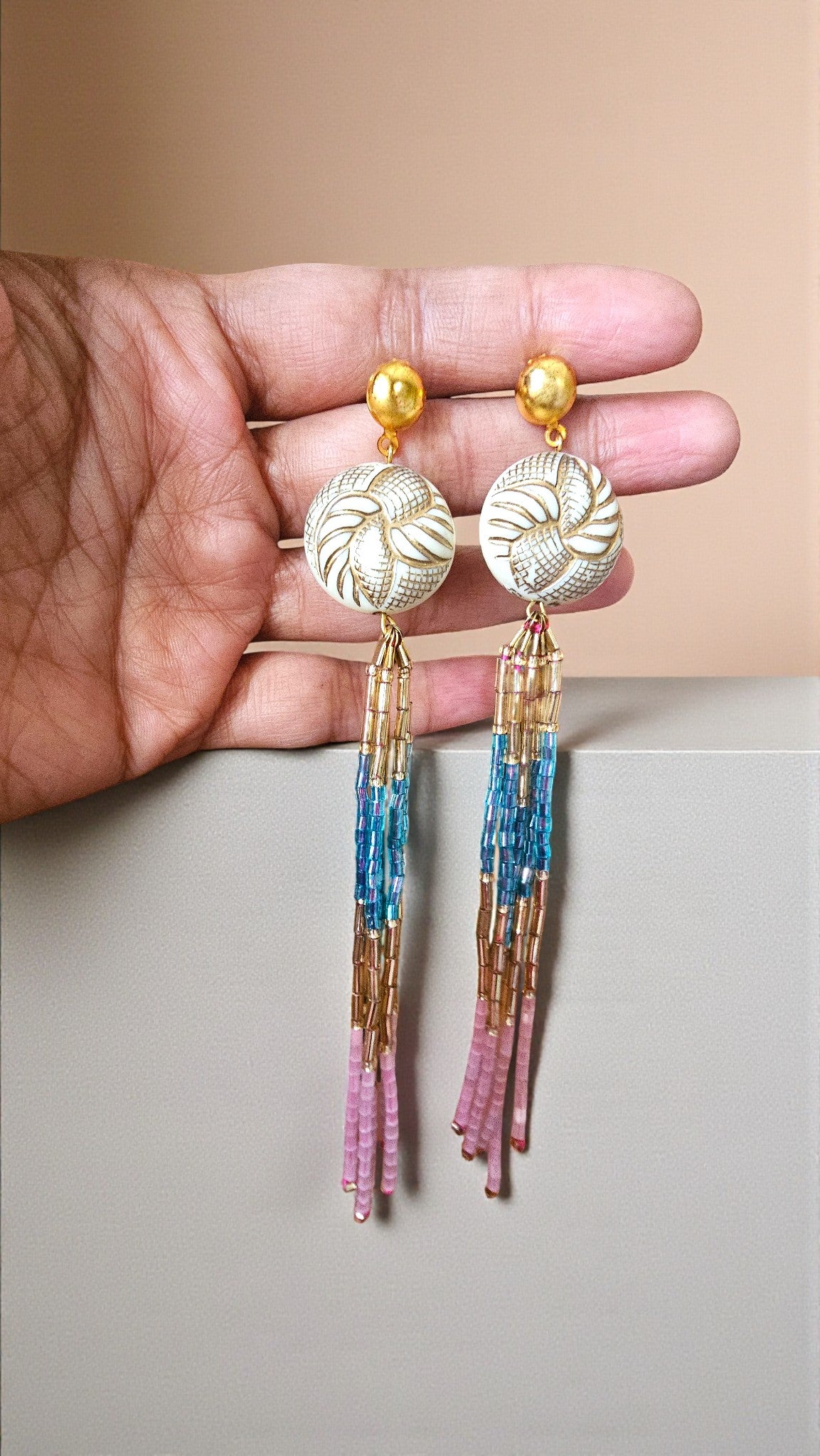 Woven Horizon Tassels Long Multicolor beaded Earrings from Anusangi Collections held in hand