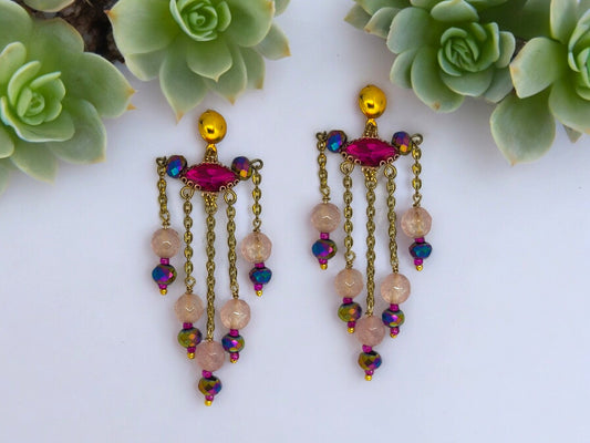 Anusangi Collections Xiti beaded statement earrings with gold chains and colorful beads on white background